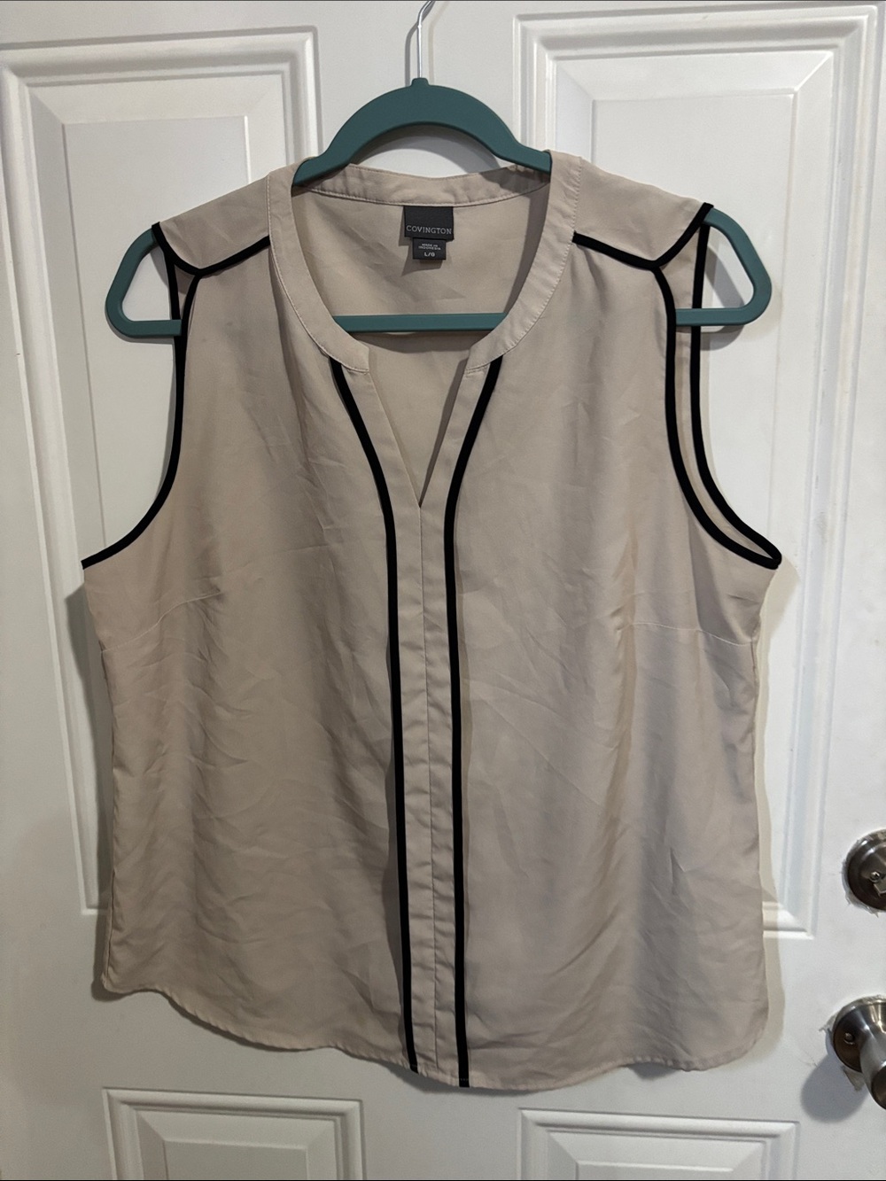 Covington Cream Sleeveless Blouse with Black Trim